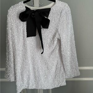 Elegant White Sequin Top with Black Bow